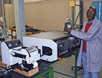 Eric Sithole, Webb cable assembly department supervisor, with the Schleuniger RS unit.